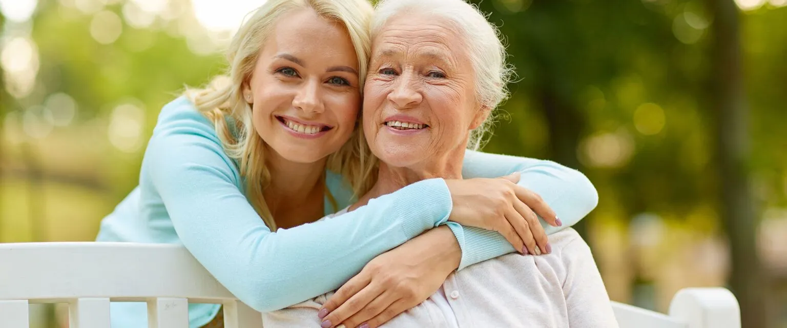Mother and daughter on bench