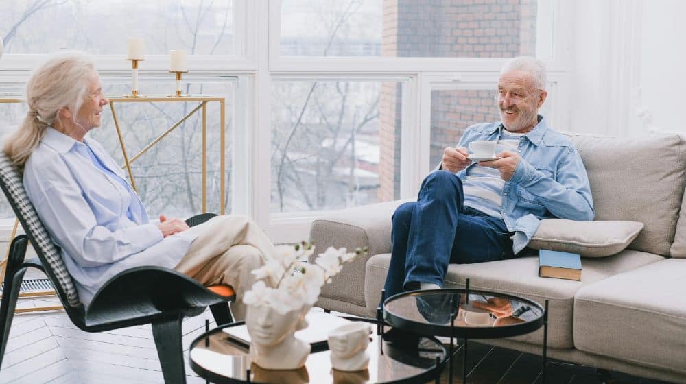 Elderly Couple Talking Together