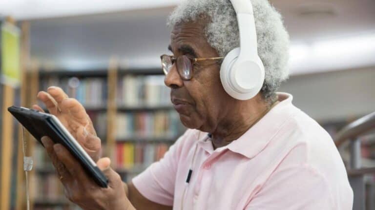 Elderly Man Wearing Eyeglasses Using Digital Tablet px featured image | Gadgets for Seniors