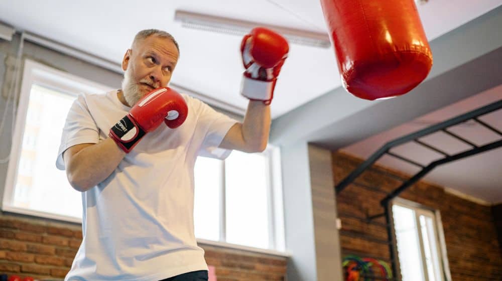 Man Hitting the Heavy Bags pexels