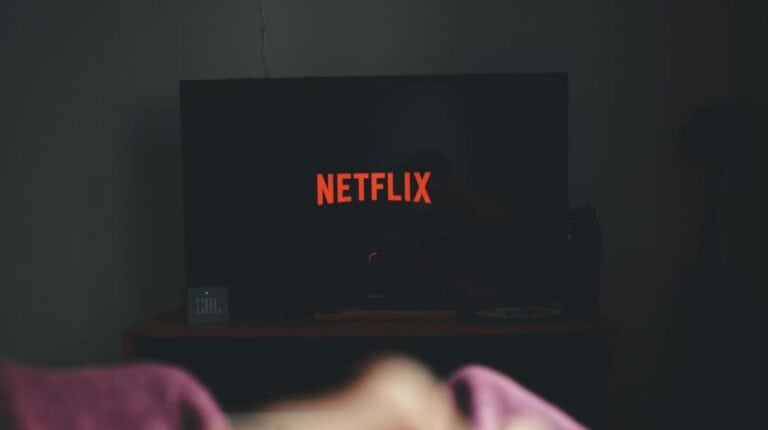 Vertical Shot of Watching Netflix on TV | netflix shows for seniors px