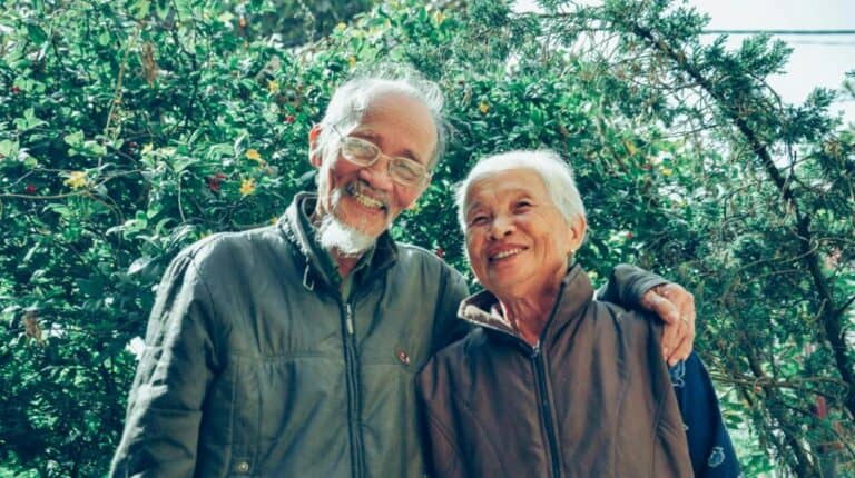 Senior Center in Cedar Rapids | Smiling Man and Woman Wearing Jackets