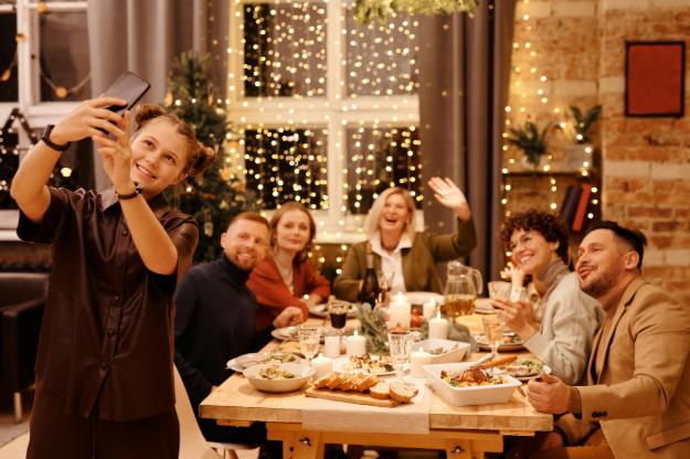 Family Celebrating Christmas Dinner While Taking Selfie | Christmas Eve Meals for Seniors px